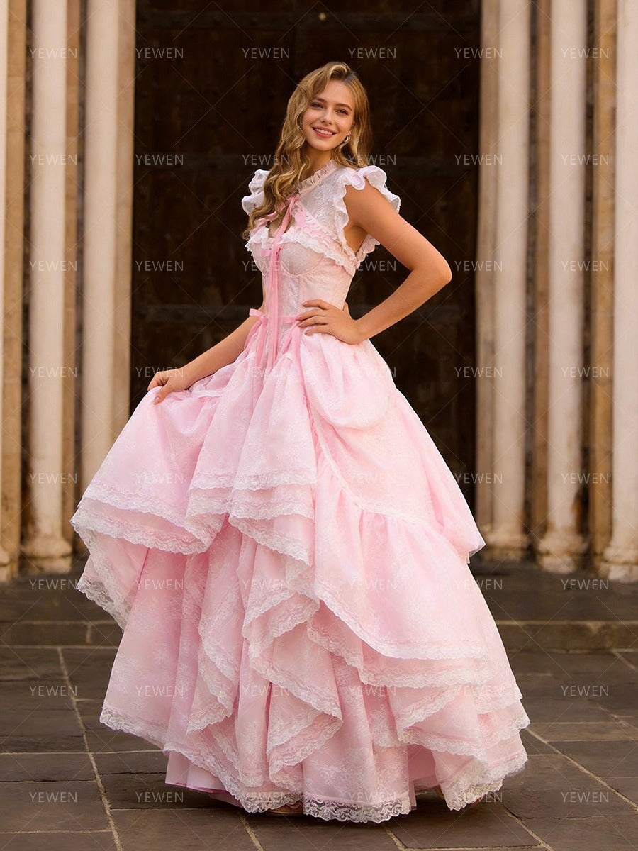 Side view of pink princess photoshoot dress showing adjustable train and flowing fairytale silhouette