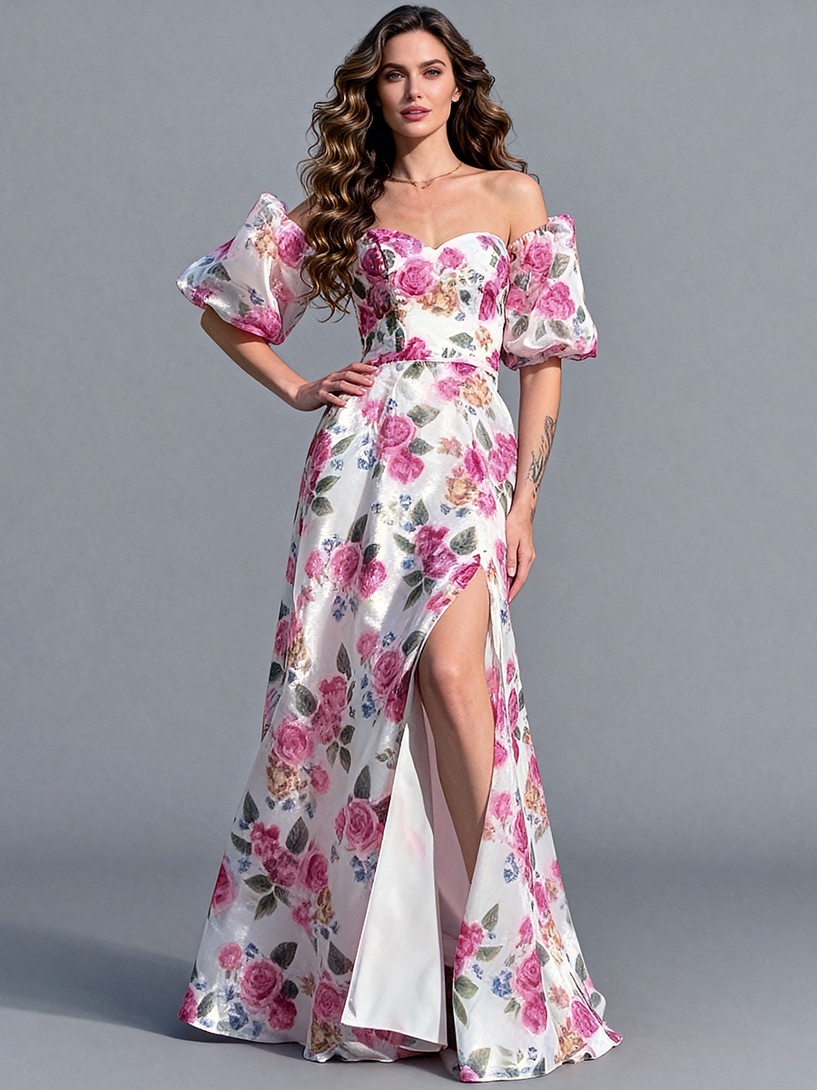Full front view of a model wearing a floral organza elegant outdoor photoshoot dress with off-shoulder puff sleeves and a high slit.