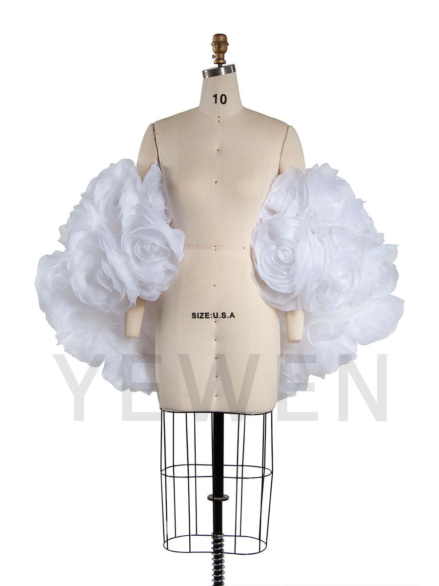 Front view of white 3D flower cape maternity photoshoot cover up for women designed for elegant wedding and photography styling