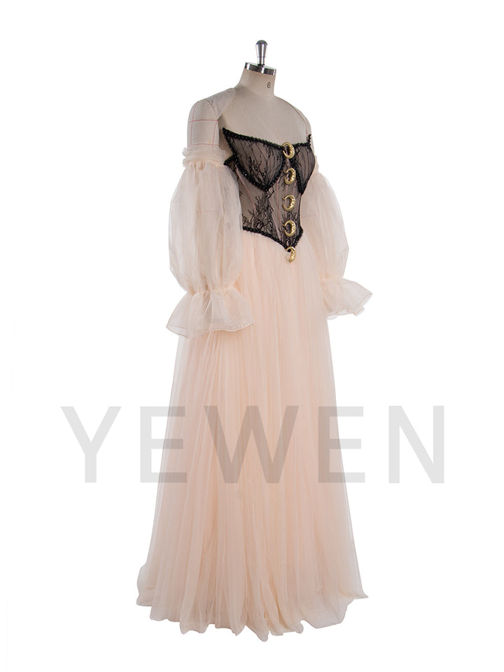 Side view of A-line photoshoot dress showing flowing ball gown skirt and structured corset waist design