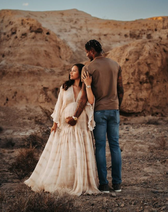 Elegant boho maternity photoshoot dress styled in natural light for pregnancy photography
