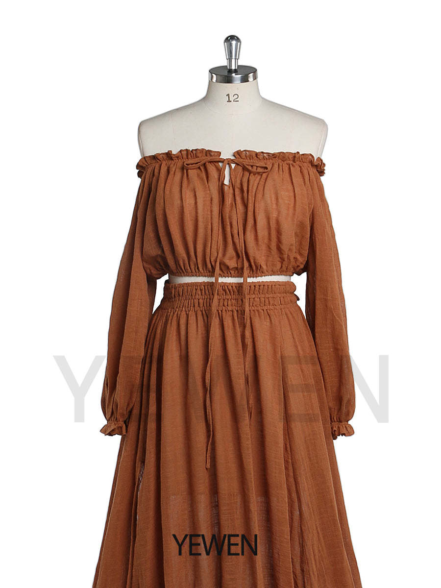 Close-up of stretchy waist and soft bohemian fabric on boho maternity photoshoot dress set