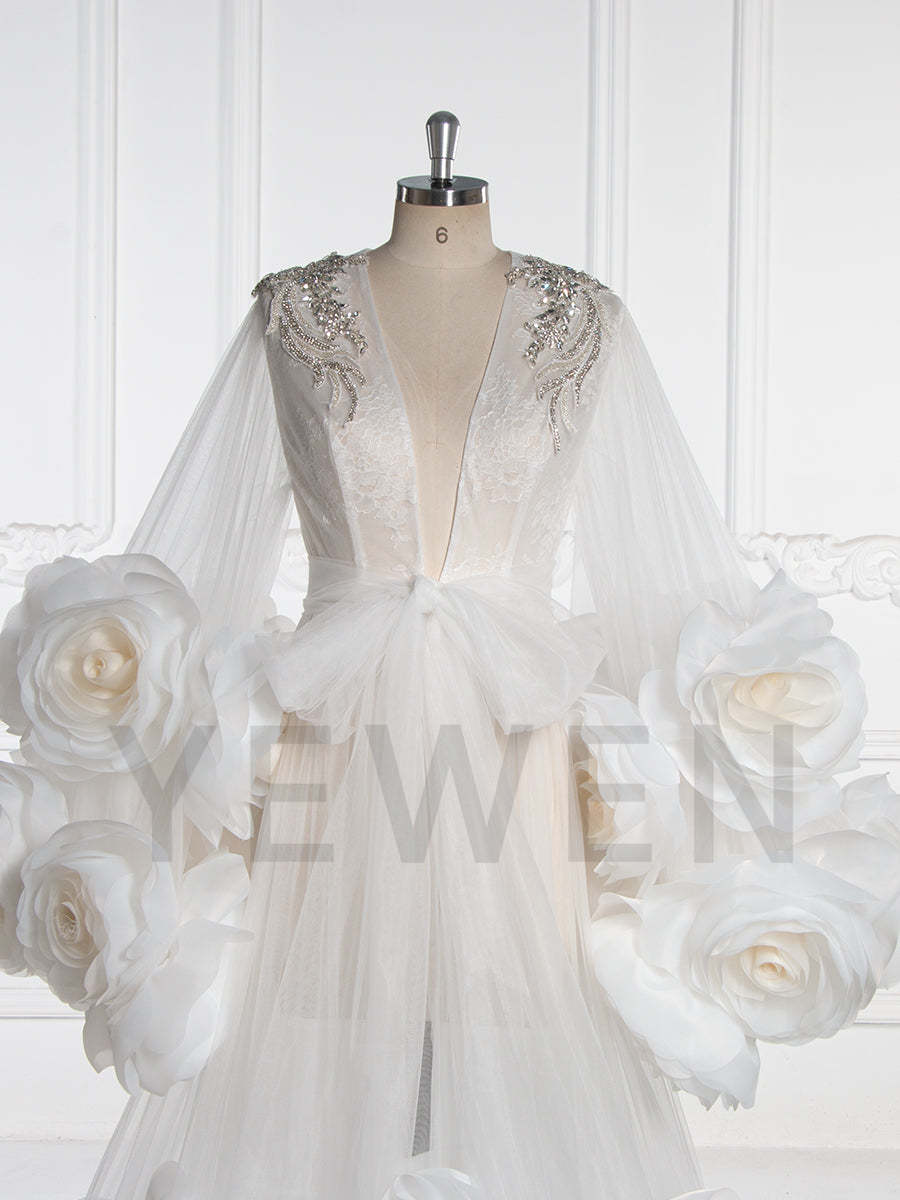 Close-up of front view 3D floral detailing on bridal photoshoot robe showing luxury handmade craftsmanship