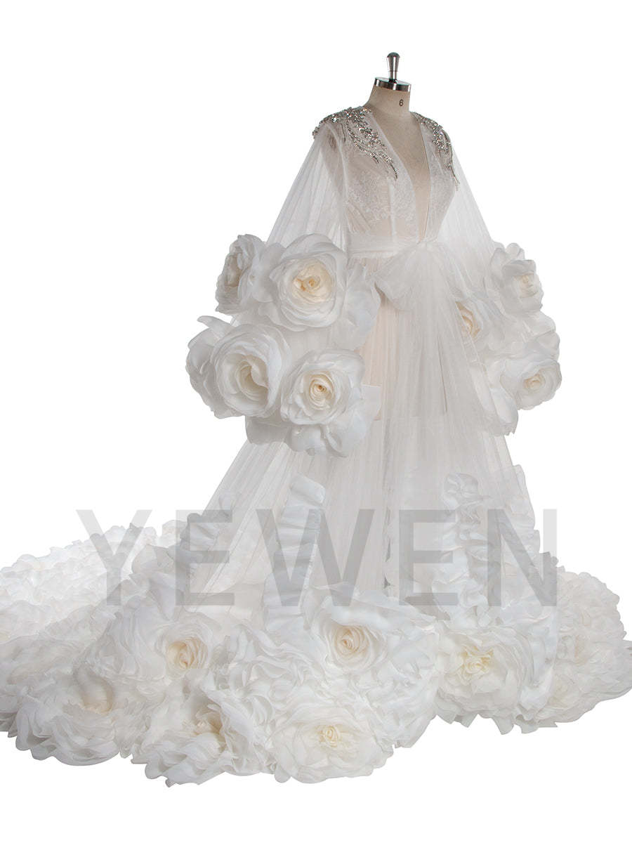 Side view of bridal photoshoot robe showing flowing luxury fabric and 3D floral design movement