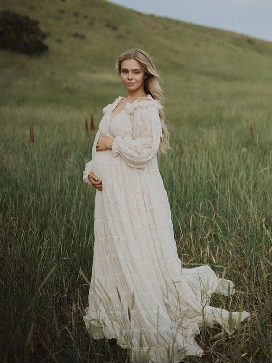 Elegant chiffon maternity photoshoot dress styled in soft light for romantic pregnancy photography