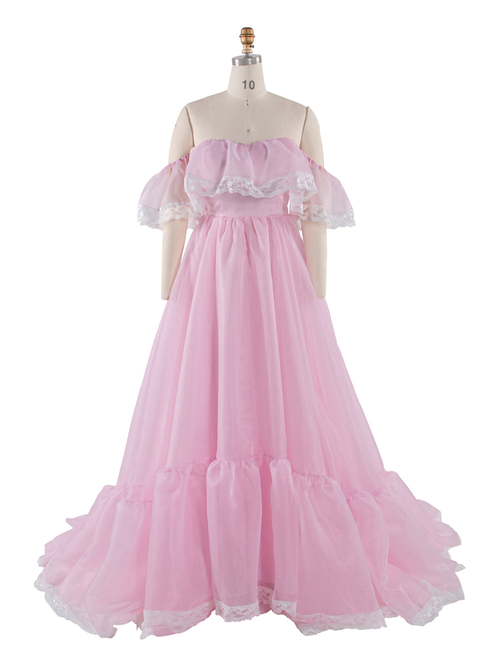 Front view of fairy dress featuring pink organza fabric and delicate lace details with an elegant feminine silhouette