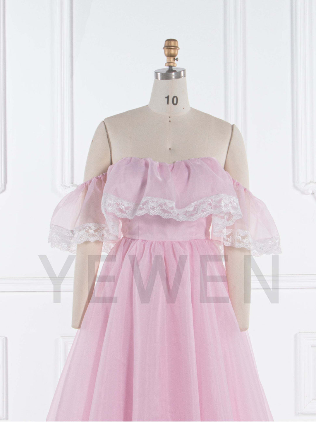 Romantic pink fairy dress styled for elegant wedding guest and special occasion photography