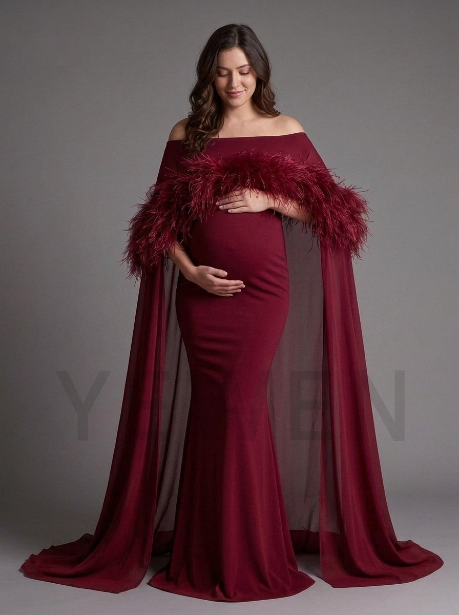 Back view of a burgundy maternity baby shower gown, showing the zipper back closure.
