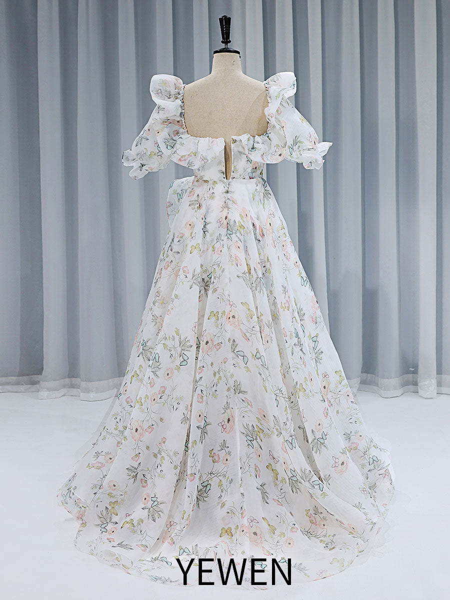 Back view of floral fairy dress with a flowing floral print gown design for prom and photography sessions
