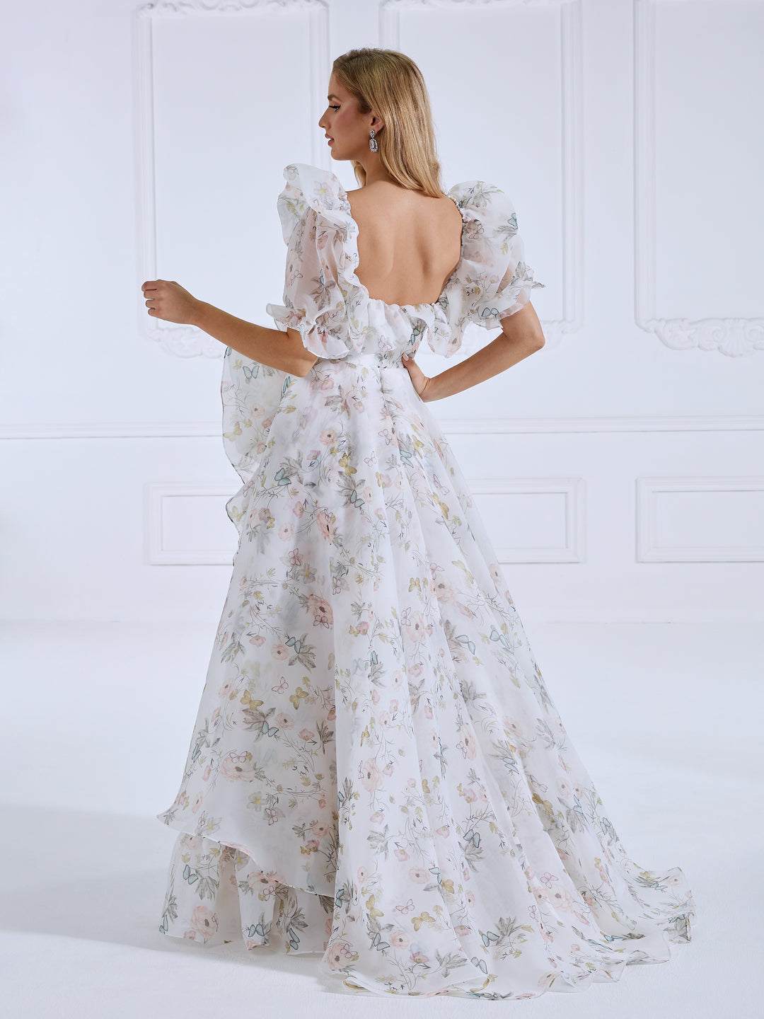 Back view of floral fairy dress with a flowing floral print gown design for prom and photography sessions