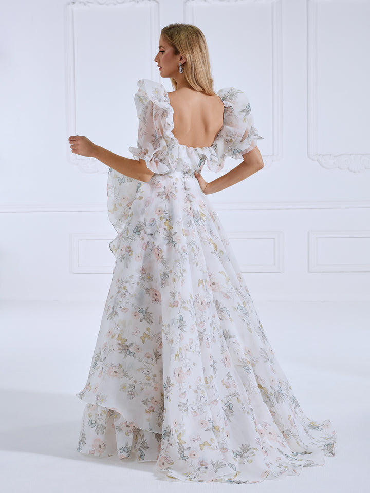 Back view of floral fairy dress with a flowing floral print gown design for prom and photography sessions