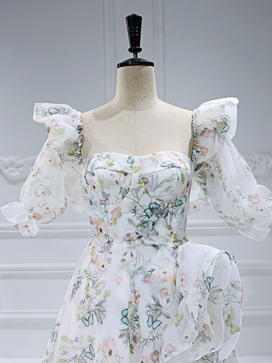 Close-up of floral print details on floral fairy dress showing delicate patterns and elegant fabric texture