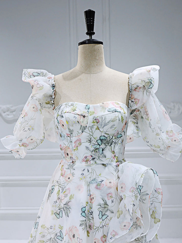 Close-up of floral print details on floral fairy dress showing delicate patterns and elegant fabric texture