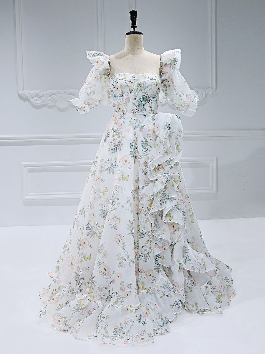Front view of floral fairy dress featuring floral printing, short sleeves, and a romantic floor length silhouette