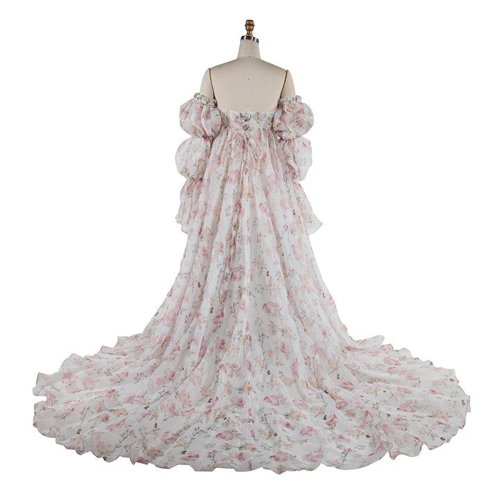 Back view of floral pink maternity dress for photoshoot with lace-up design and elegant silk organza fabric
