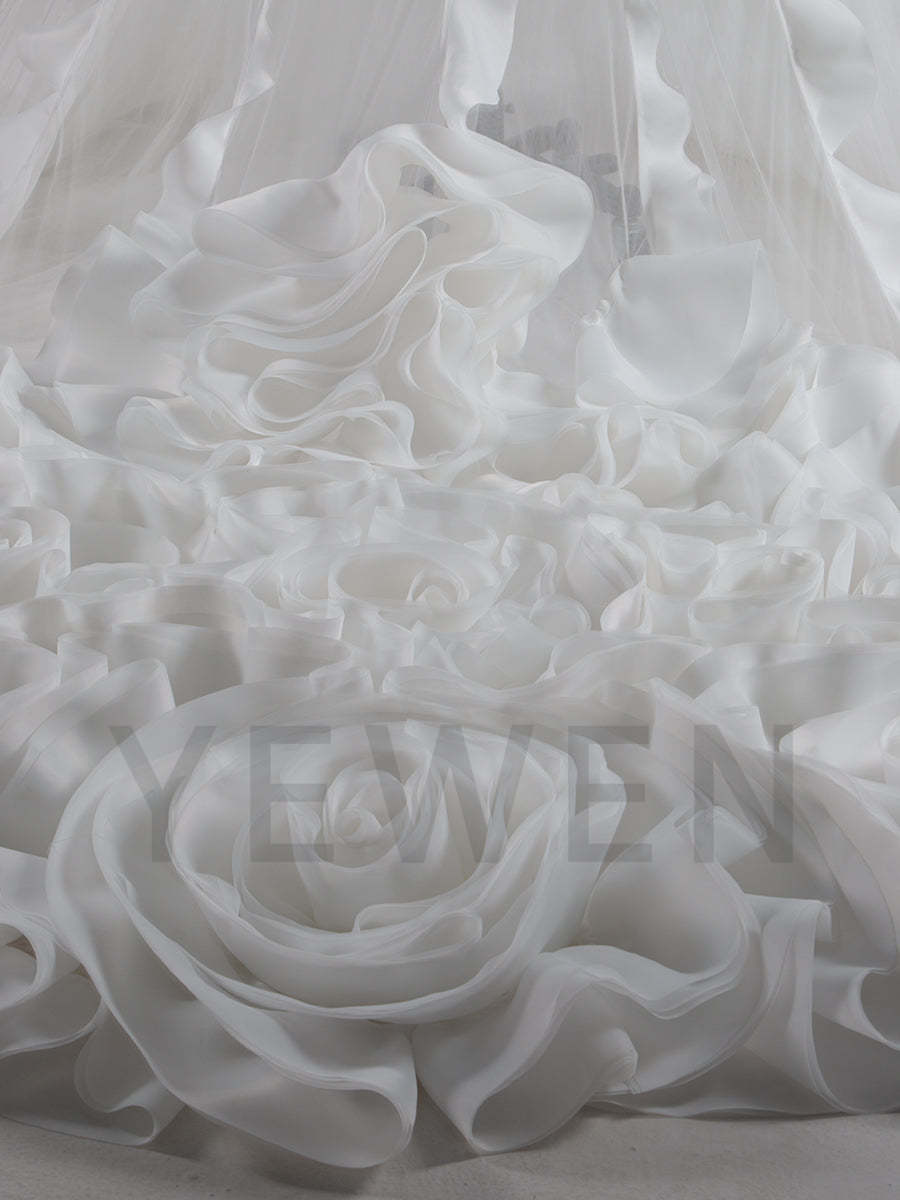 Close-up of organza ruffles detail on flower photo shoot dress showing soft texture and luxury craftsmanship
