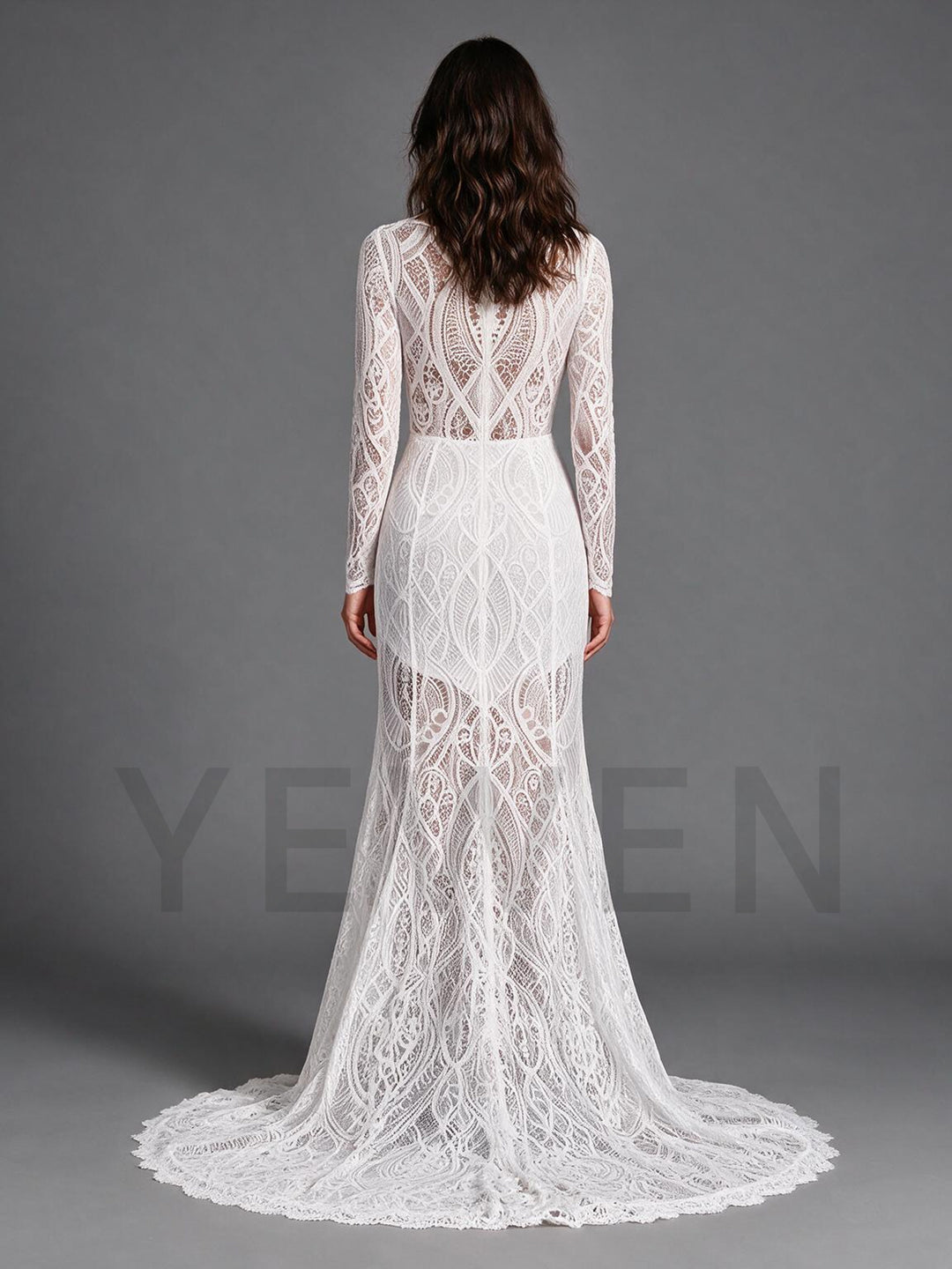 Back view of an ivory full lace boho wedding dress showing the long sweeping train.
