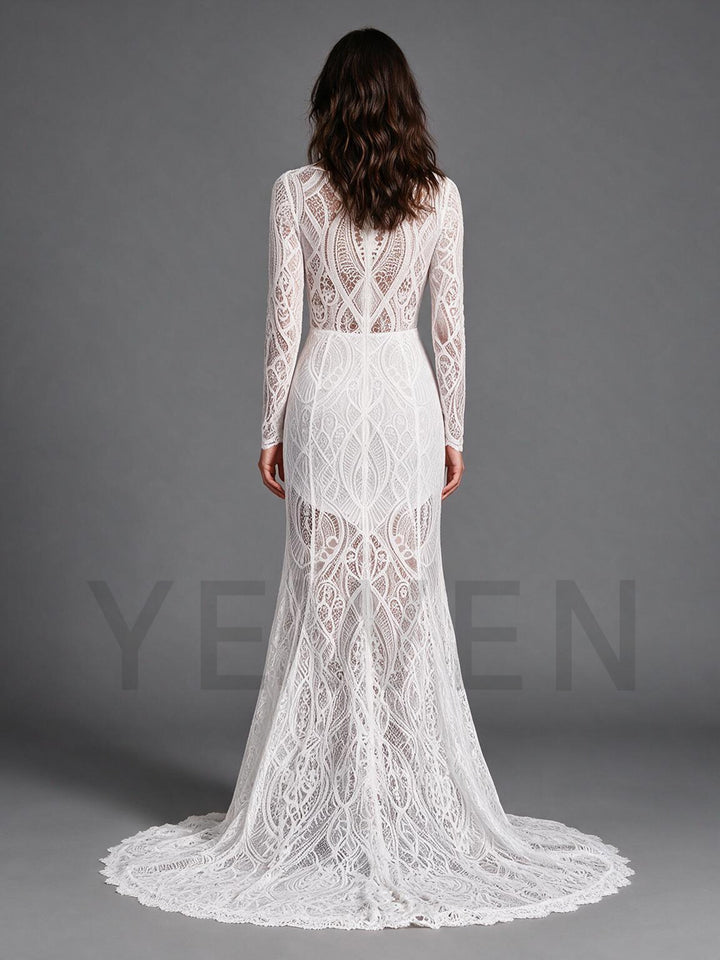 Back view of an ivory full lace boho wedding dress showing the long sweeping train.