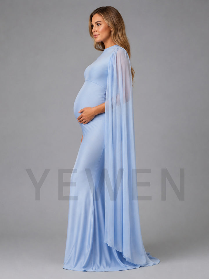 A pregnant woman wearing a light blue maternity gown with a sheer draped cape overlay, standing in profile against a solid gray studio background. A large semi-transparent watermark reading 'YEWEN' is overlaid across the center.