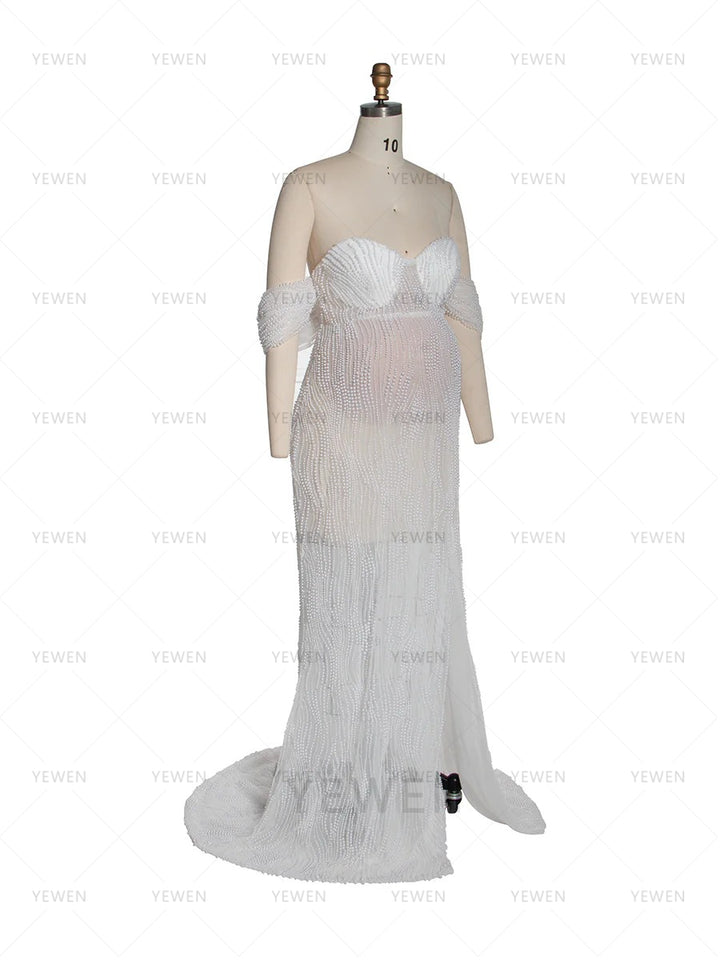 Side view of luxury pearl maternity fitted dress highlighting body shape for photoshoot and baby shower styling