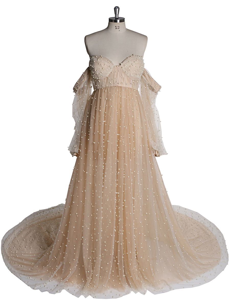 Front view of ivory maternity photoshoot gown with open front design and elegant pearl detailing