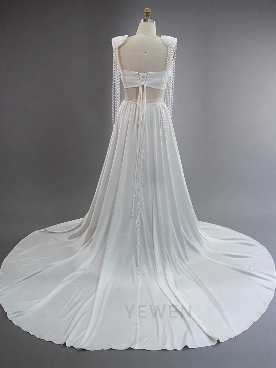 Back view of elegant pearl maternity photoshoot gown with refined detailing