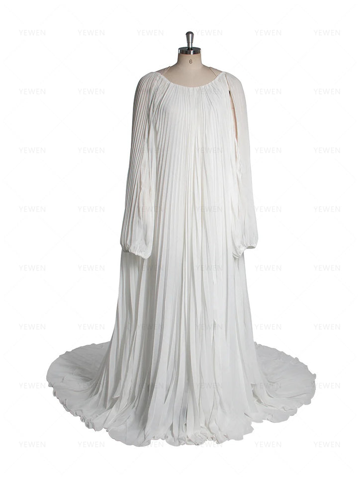 Front view of white pleated blue maternity photoshoot dress featuring off shoulder design and elegant flowing silhouette