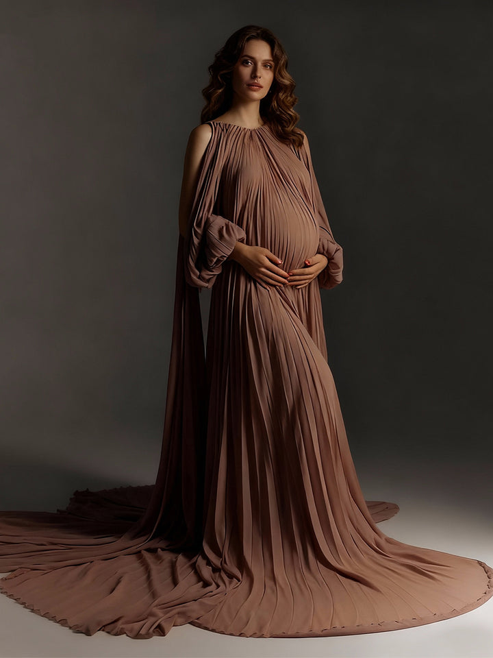 Pregnant woman wearing pleated brown maternity photoshoot dress in studio pregnancy and baby shower photography