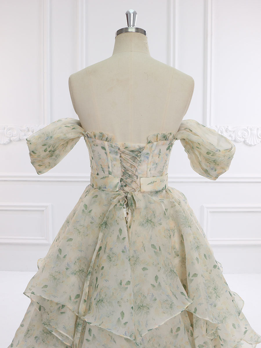 Close-up back detail of prom dress highlighting the 30cm train and flowing floral gown design