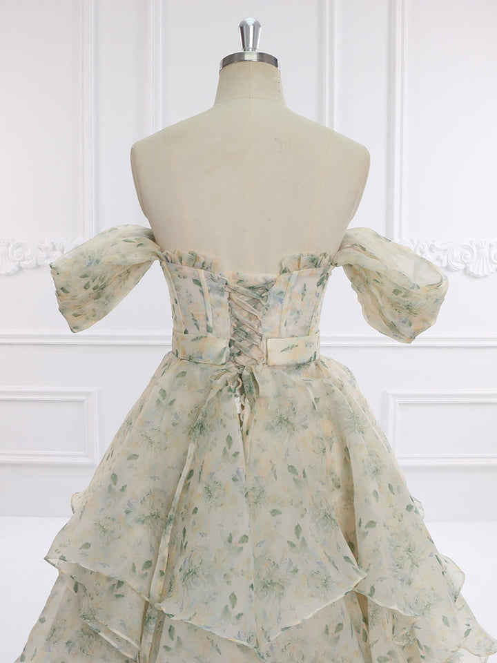 Close-up back detail of prom dress highlighting the 30cm train and flowing floral gown design