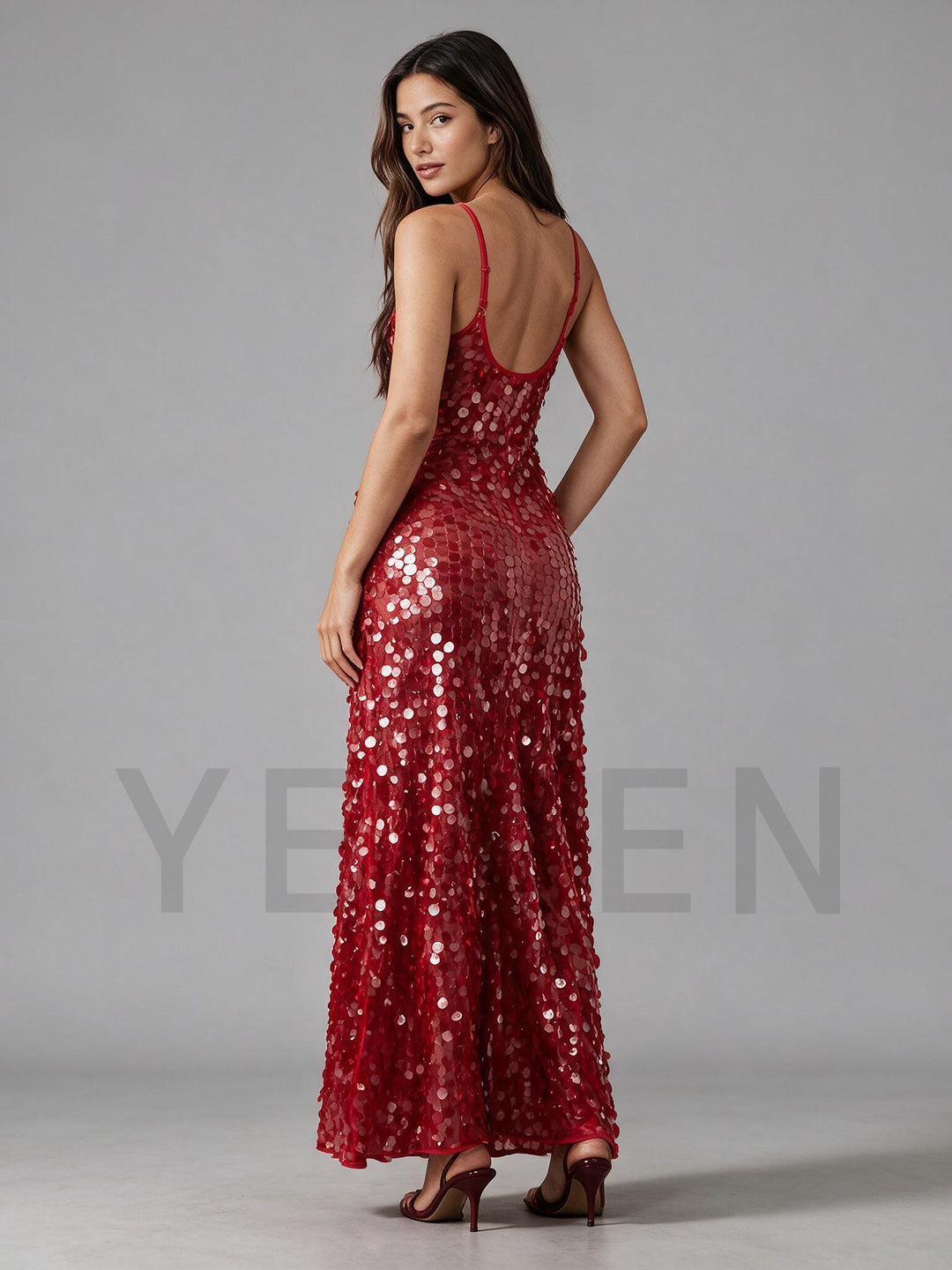 Back view of a red sequin Christmas party gown, showing the fitted silhouette.