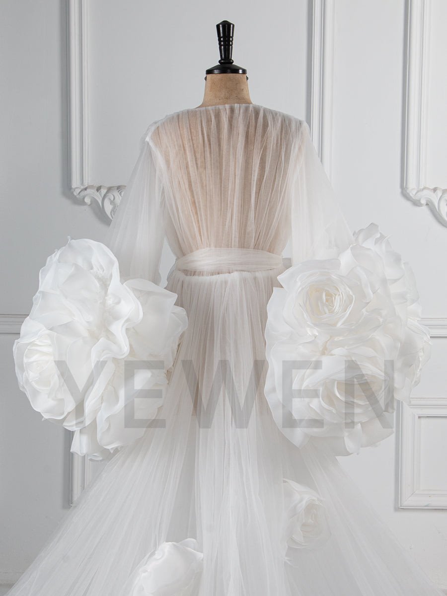 Close-up of 3D rose floral detailing on sheer tulle special occasion dress showing luxury craftsmanship
