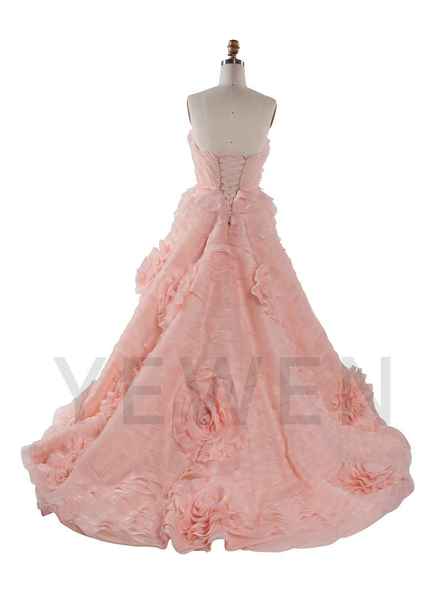 Back view of luxury strapless tiered flower evening dress designed for birthday party and formal evening occasions