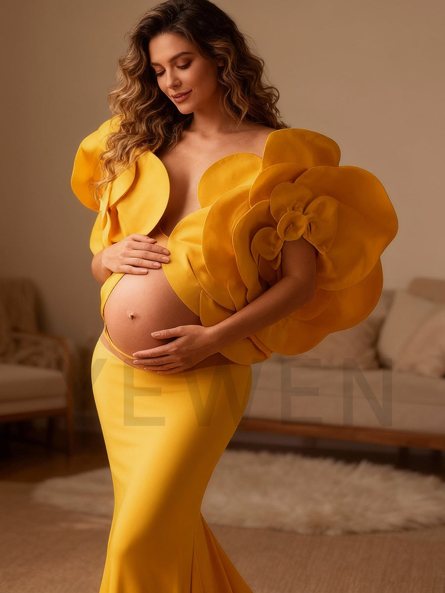 Full body view of stretchy maternity dress for photoshoot with handmade flower bicep sleeves and elegant flow