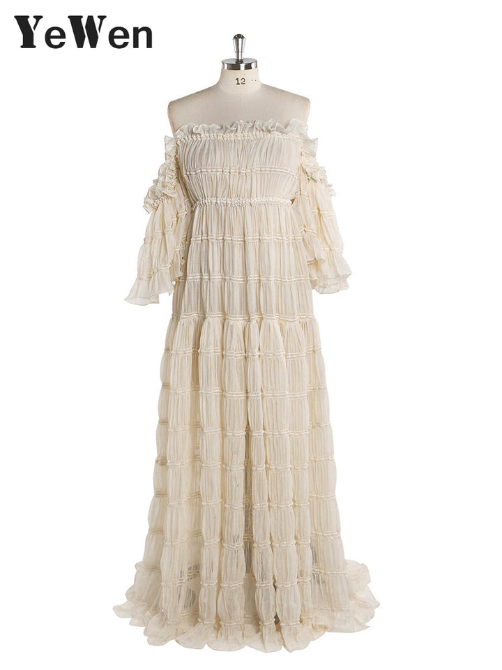 Front view of summer beach dress for photo shoot with off shoulder design and elegant boho silhouette