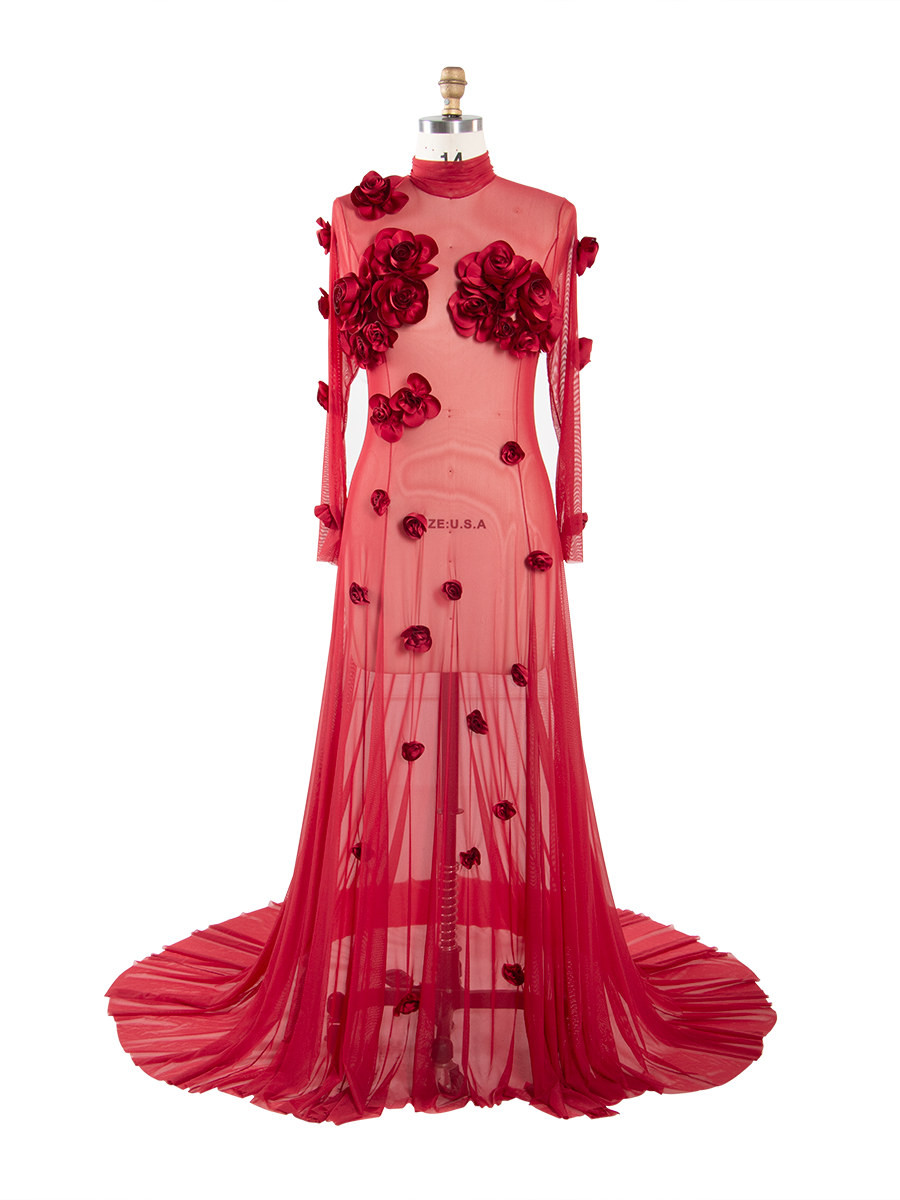 Red evening gown with floral embellishments on a mannequin against a white background