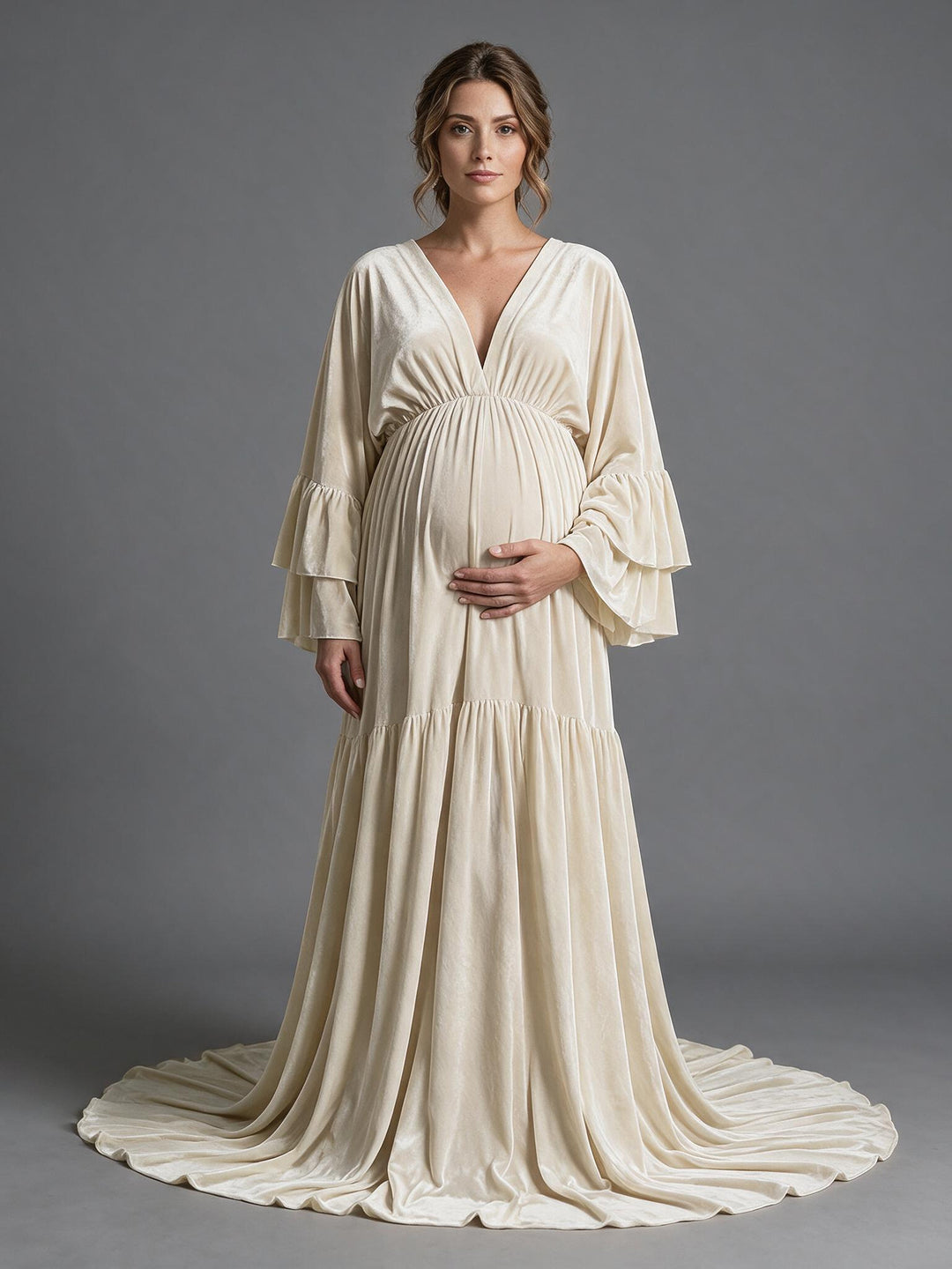 Cream velvet maternity photoshoot dress with deep V-neck and tiered sleeves, front view.