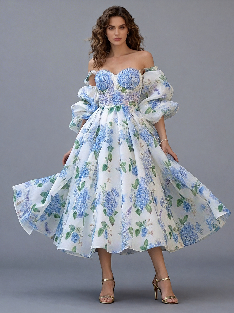 Full front view of a model wearing a blue floral off-shoulder midi party dress with puff sleeves and a pleated A-line skirt.