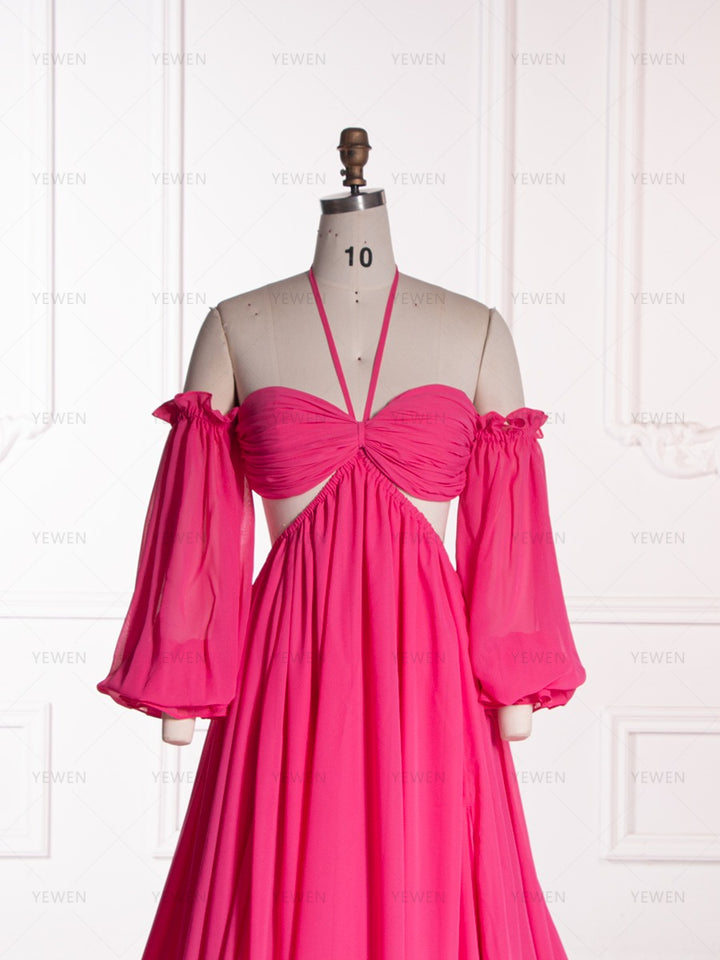 Close-up front view of a hot pink chiffon boho photoshoot dress with a halter neckline detachable puff sleeves and a twisted waist displayed on a mannequin.