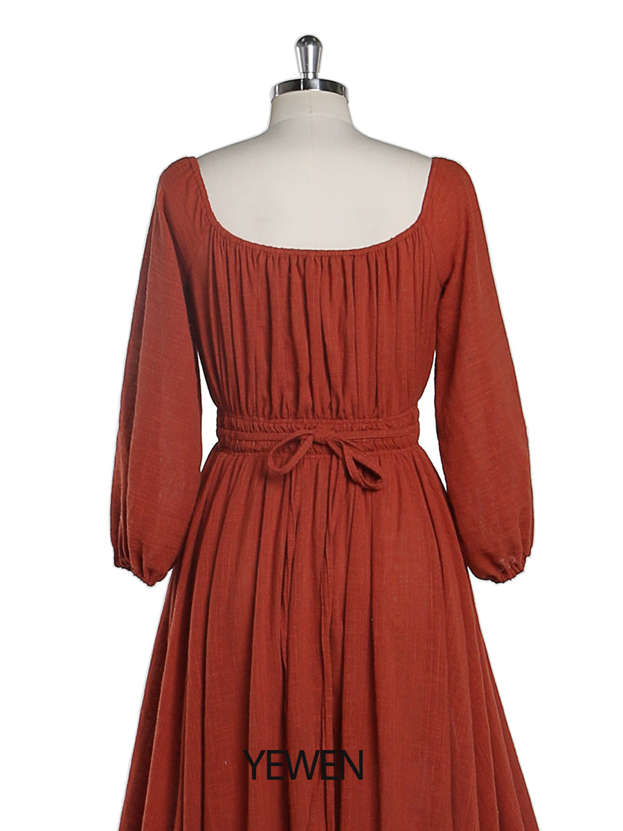 Back view of rust boho maternity photoshoot dress designed for baby shower and maternity photography sessions
