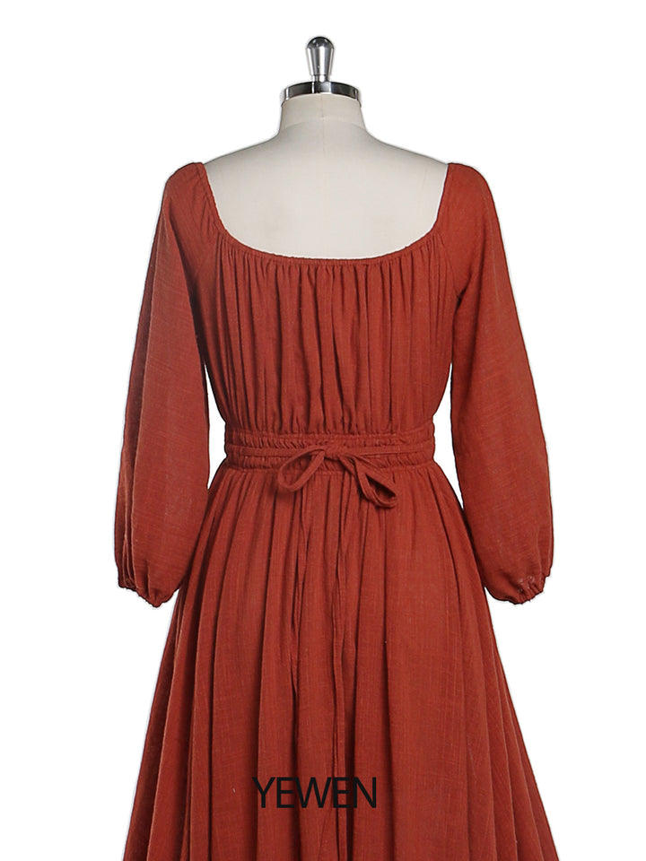 Back view of rust boho maternity photoshoot dress designed for baby shower and maternity photography sessions