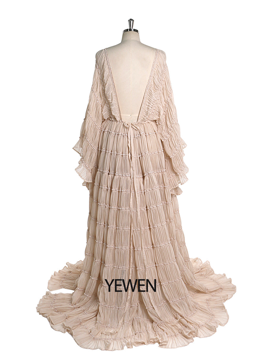 Back view of kahaki boho maternity photoshoot dress designed for elegant pregnancy photography
