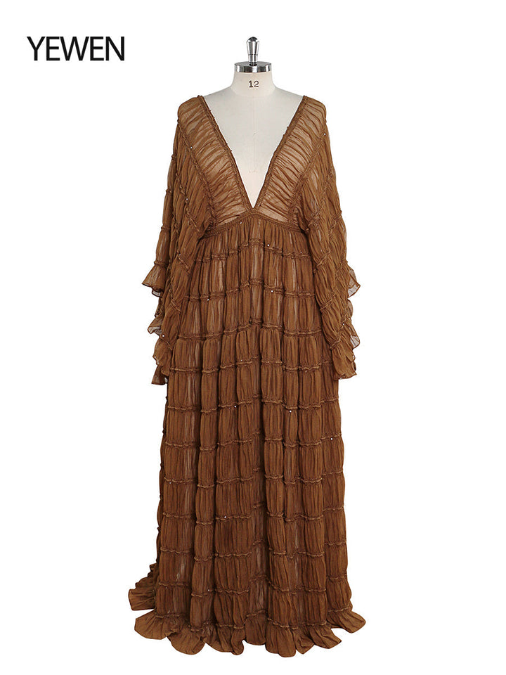 Front view of brown maternity photoshoot dress with flowing slip silhouette for elegant maternity photography
