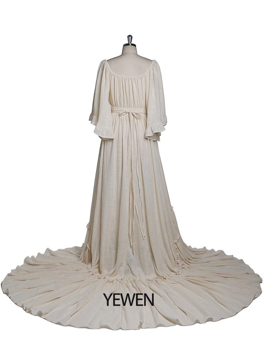 Back view of boho photoshoot dress with flare sleeves designed for elegant maternity photography