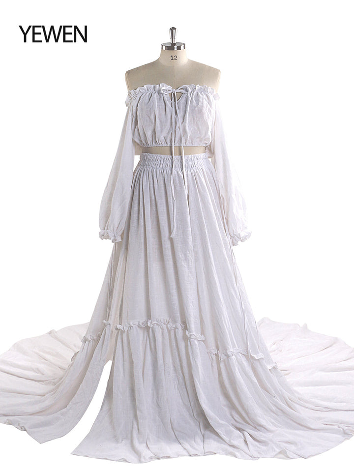 Front view of boho white photoshoot dress with flowing silhouette and stretch waist design
