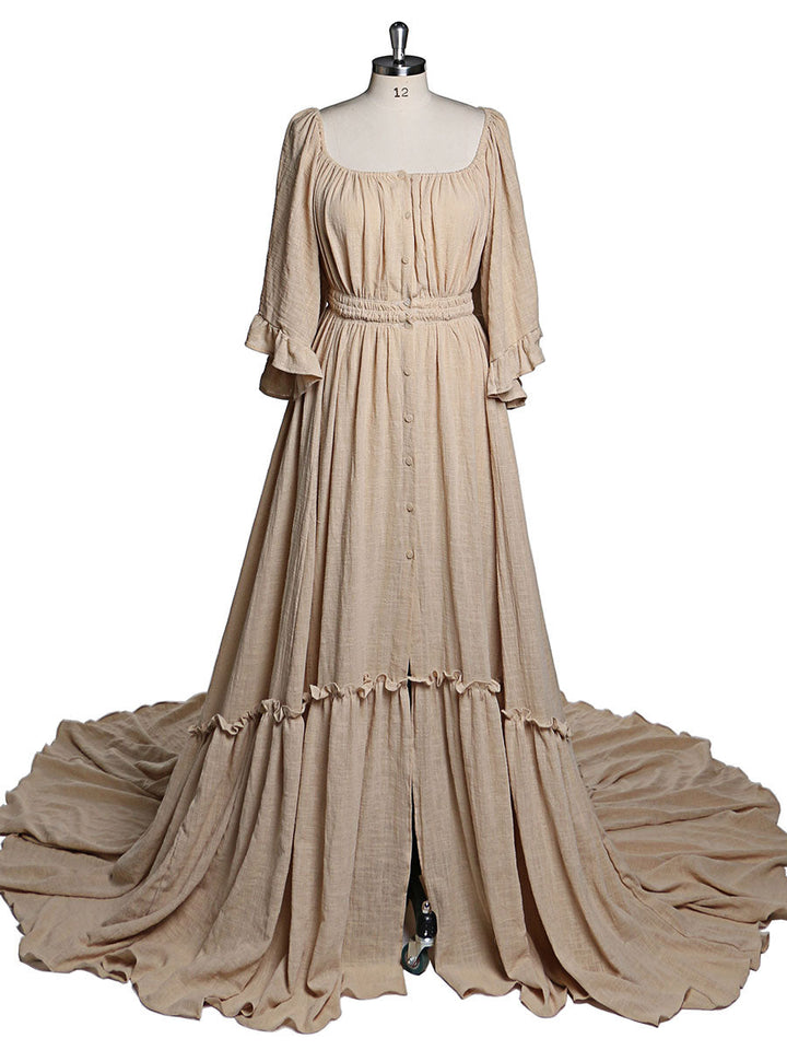 Full body view of boho photoshoot dress with flare sleeves designed for elegant maternity photography