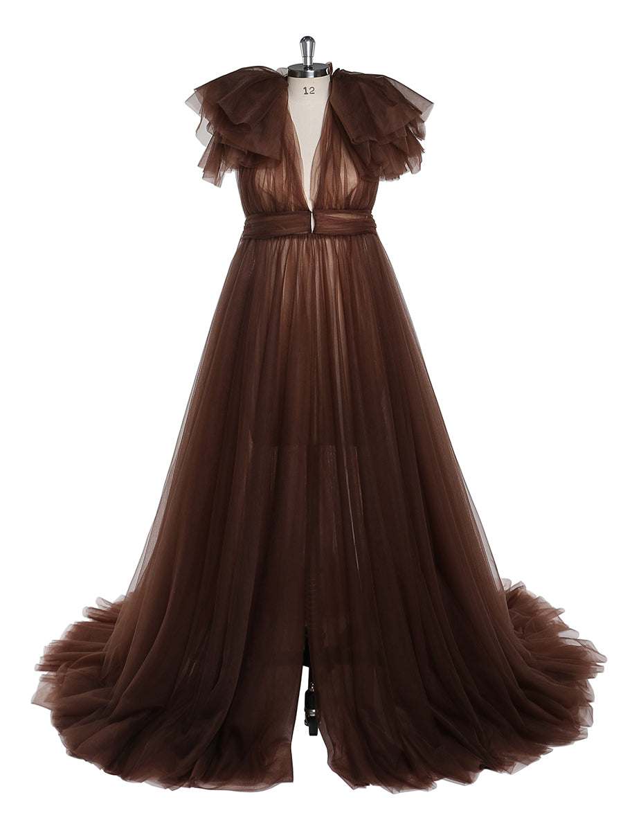 Front view of brown maternity dress for photo shoot featuring tulle flowers and flowing maxi design