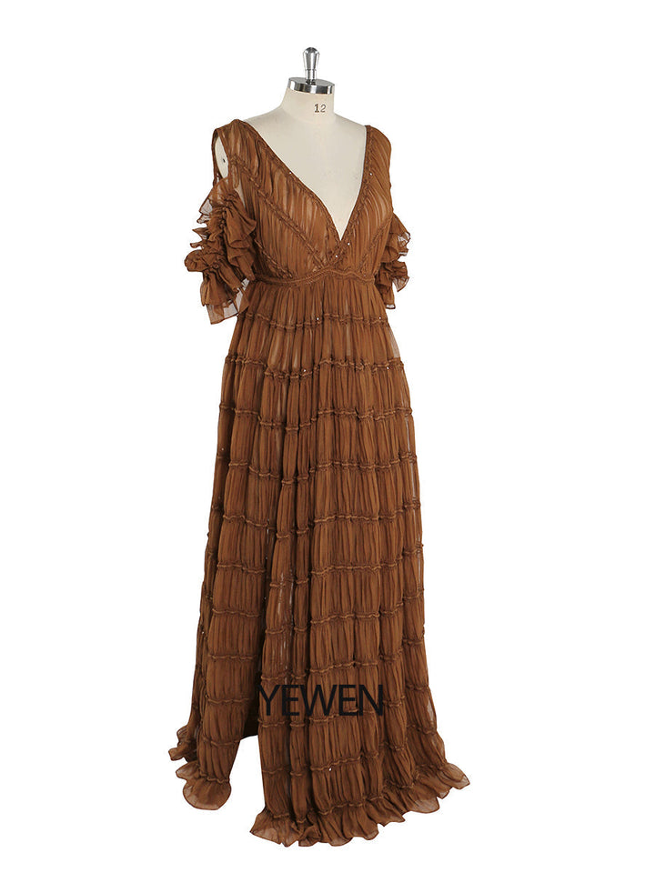 Side view of brown chiffon dress for photo shoot showing side slit and flowing chiffon maxi skirt movement