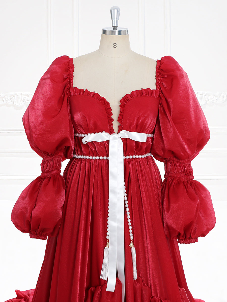 Close-up of fairy dress featuring a red elegant gown design for Christmas parties, photography, and formal events