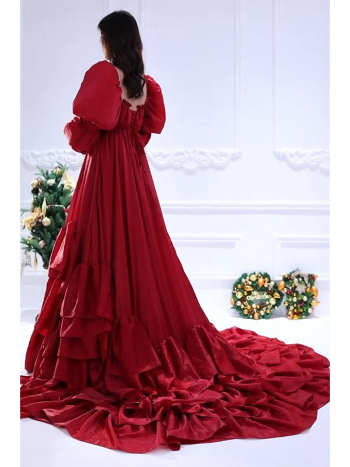 Full body view of fairy dress with a flowing red gown silhouette for prom and photography occasions
